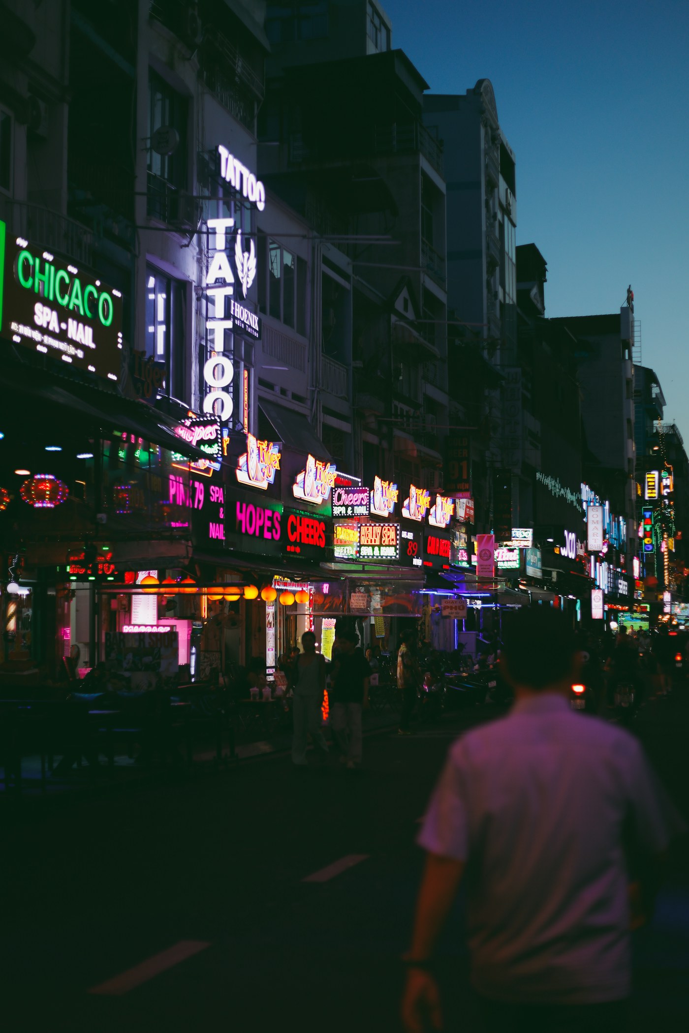 Neon lit nightlife street in Ho Chi Minh City
