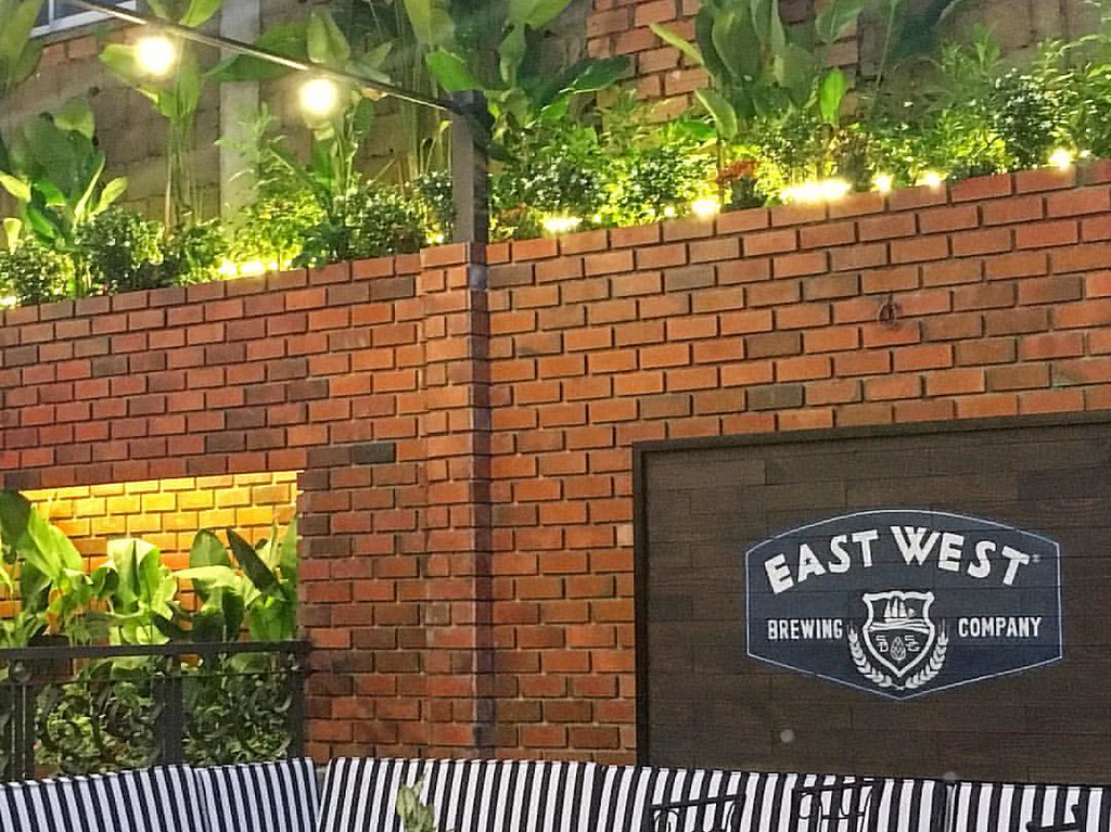 Branded brick interior at East West Brewing Company in Saigon, photographed in 2017